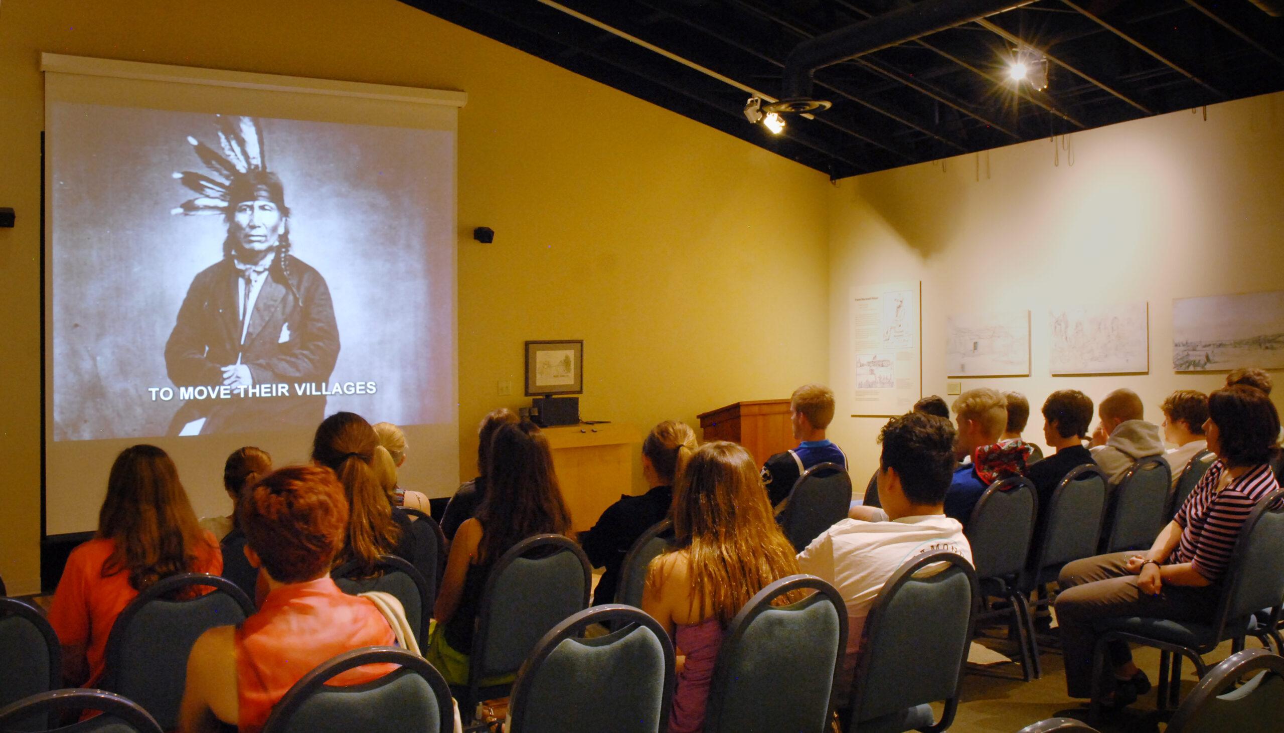 Students watching introductory film