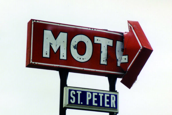 Bent motel sign by the Dairy Queen