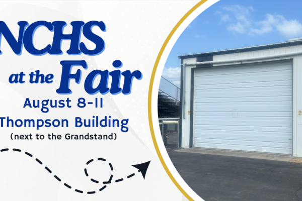 A promotional flyer for the NCHS Fair taking place August 8-11 at the Thompson Building next to the Grandstand. The flyer features a large closed white garage door of the Thompson Building under a blue sky. An arrow points from the date details to the door.