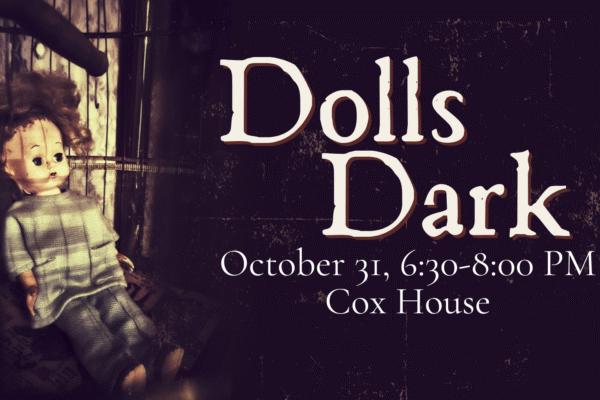A doll with curly hair and striped clothes sits inside a metal birdcage. Text on the right reads: "Dolls Dark, October 31, 6:30-8:00 PM, Cox House," against a dark, distressed background.