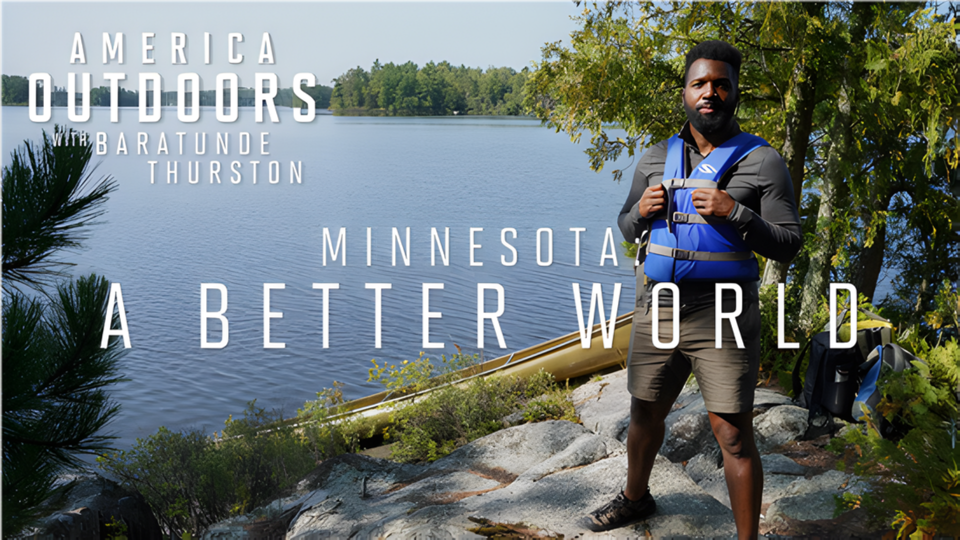 A man wearing a blue life vest stands on a rocky shore next to a lake with trees in the background. Text on the image reads: "America Outdoors with Baratunde Thurston. Minnesota: A Better World.